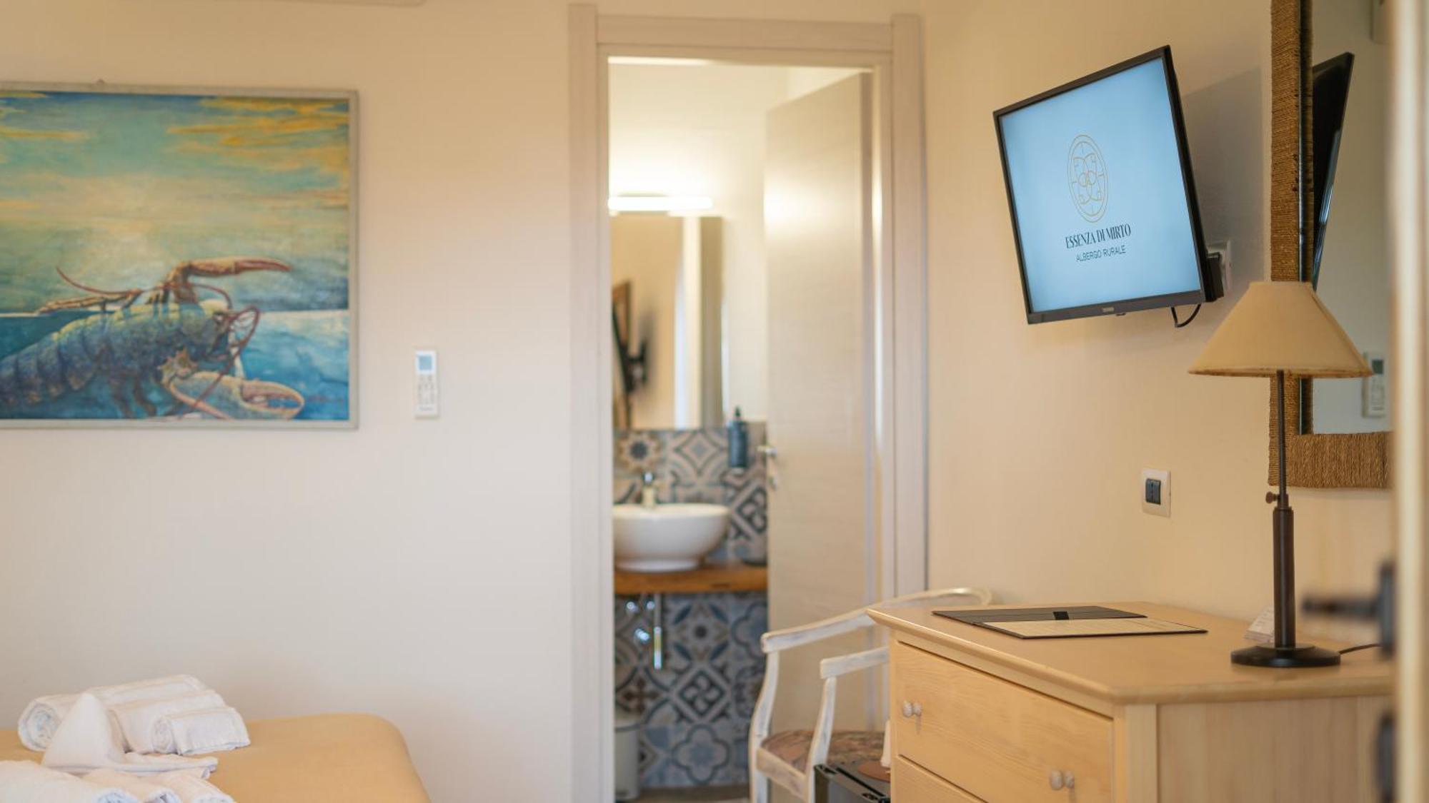 Hotel Essenza Di Mirto La Caletta Δωμάτιο φωτογραφία