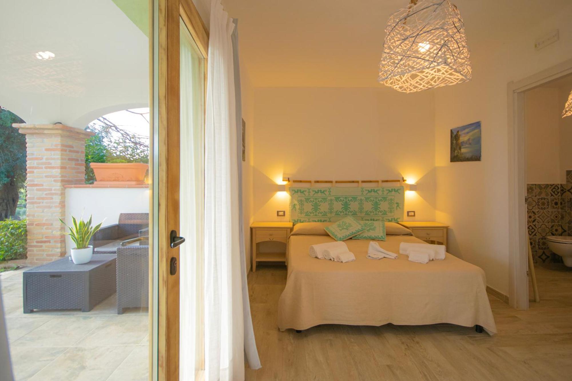 Hotel Essenza Di Mirto La Caletta Δωμάτιο φωτογραφία